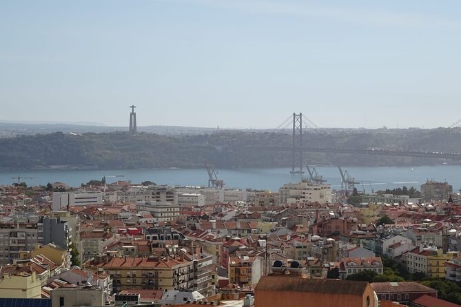 1-hour private eco tuk-tuk tour for up to 6 people through Lisbon - Miradouro Das Portas do Sol: Tagus Views and Alfama Rooflines