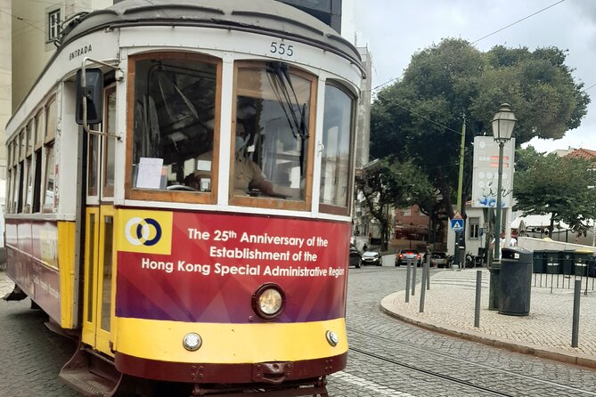 1-hour private eco tuk-tuk tour for up to 6 people through Lisbon - Alfama Finish: Fado Roots, Narrow Lanes, and Ginginha