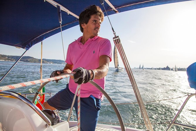 2,5h Lisbon Sunset Sail with Drinks and Snacks - Cais do Sodré and Alcantara-Mar, old neighborhoods meet fun downtown energy