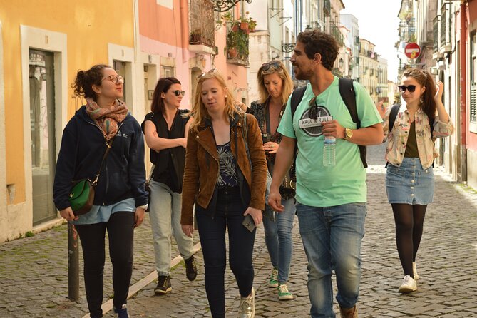 2-hour city tour of Lisbon's highlights - Time Out Market Lisboa as your finish, plus written food and plan tips