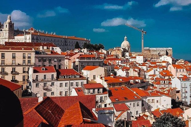 2 Hour Tuk Tuk Tour of the Old Town it will make you fall in love - Stop 5: Alfama, Lisbon’s original neighborhood and a taste of ginja