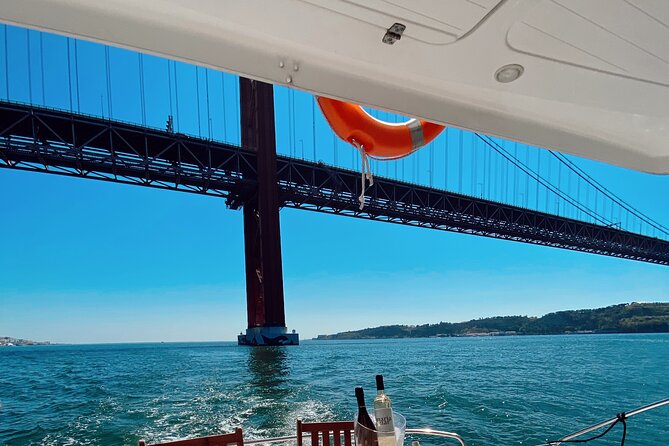 2H Lisbon Private Luxury Catamaran Tour with Welcome Drink - Architecture Up Close, Then Exhibitions on the Riverfront