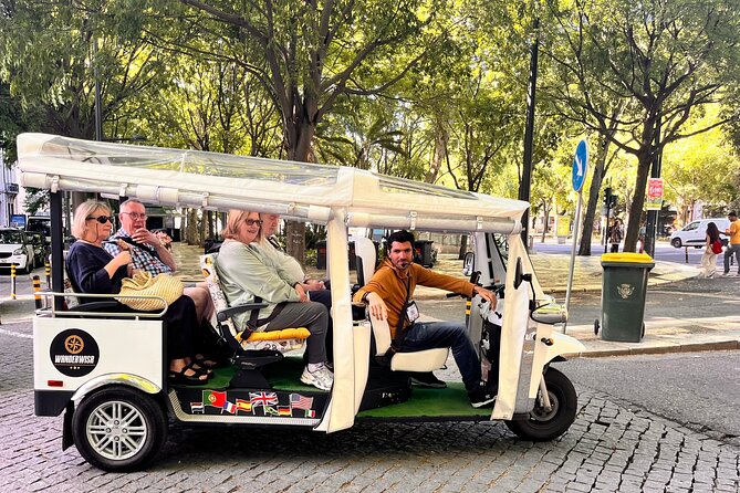 2h Tour | Explore Lisbon’s Hills & Viewpoints - Hotel pickup to Restoradores: the easy start in a white tuk-tuk