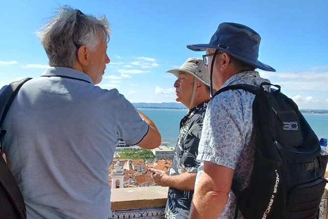 2H Tuk Tuk Tour Central Lisbon - Miradouro de Santa Luzia: Alfama views, bougainvillea, and a photo wall that gets crowded