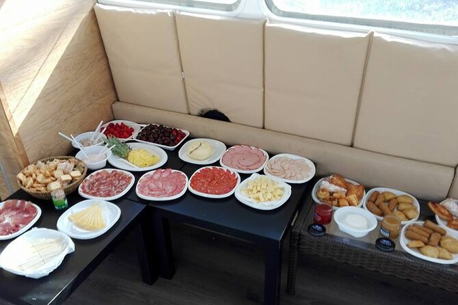 4H Private Luxury Sailboat Tour with Swim - What you’ll feel onboard: welcome drink, music, and a real group vibe