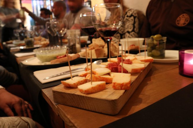 A True Taste of Lisbon: Portuguese Tapas, Wine & Surprise Drink - Key highlights worth your attention