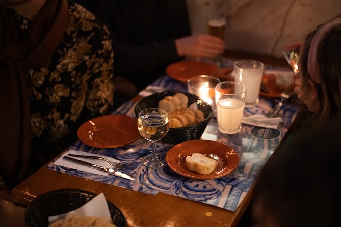 A True Taste of Lisbon: Portuguese Tapas, Wine & Surprise Drink - Bairro Alto tastings: two separate traditional eats