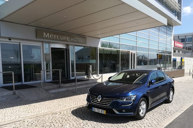 Airport Private Transfer to Costa da Caparica | Almada | Aroeira - In-Car Comfort: Bottled Water and Wi-Fi Onboard
