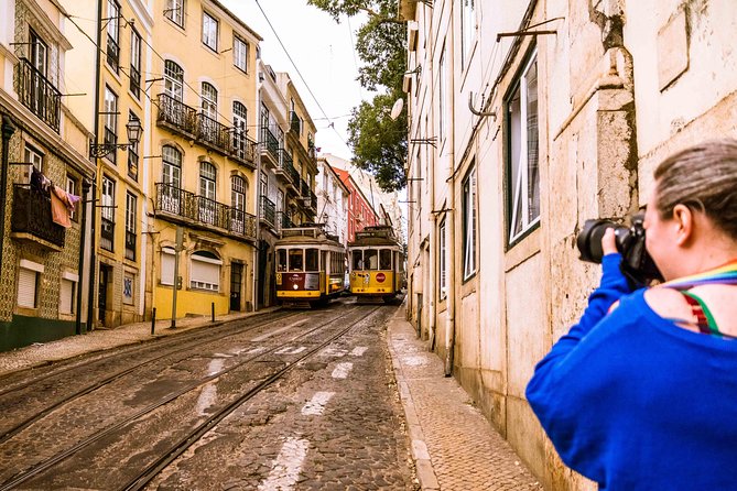 Alfama Photo Walk – Lisbon Photography Experience Led by a Local - Stop 4: Igreja de São Miguel square framing and local activity