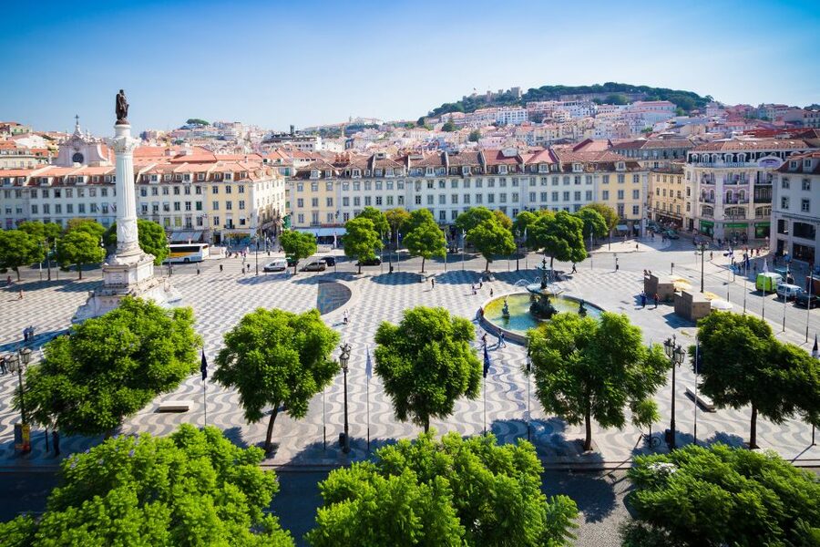 Best of Lisbon Walking Tour: Rossio, Chiado & Alfama - Alfama: Fado energy, tiled facades, and wine in the oldest lanes