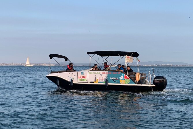 Boat Cruise with Champagne - The south bank loop: 25 de Abril Bridge and Cristo Rei views