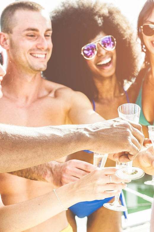 Boat Party to the Beach with Swimming Stops, DJ and Open Bar - The Open Bar Menu: Beer, Sangria, and White Wine Without the Fuss