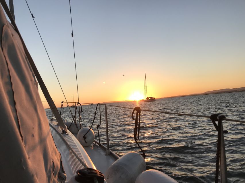 Cascais: 2-Hour Sunset Cruise - Onboard feel: small group, professional crew, and real care