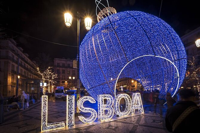 Christmas Lights Lisbon Tour with a Local in Private Eco Tuk Tuk - Chiado: elegant cafés, iconic books, and theater lights