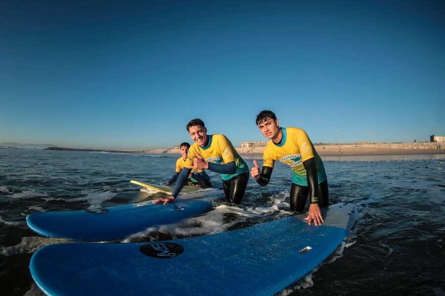 Costa da Caparica: Sunset Surf Lesson - Gear Up: Surfboard, Wetsuit, and Lycrа You Do Not Have to Buy