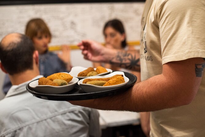 Devour Lisbon Food & Fado Tour Mouraria & Alfama Neighbourhoods - Price and value for $129.51 in a small-group night