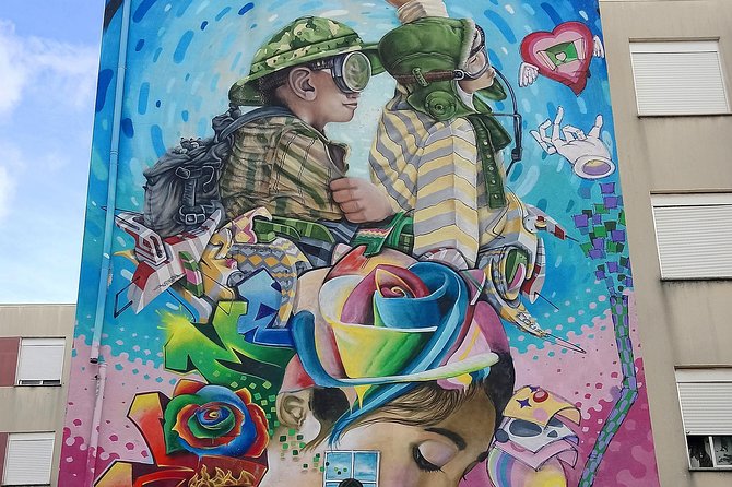 Discover Lisbon's Best Street Art - Stop 1 and 2: Castelo, Alfama, and Mouraria Street Art Alleyway Time
