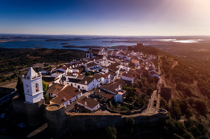 Evora and Monsaraz Private Tour From Lisbon - Heading to Monsaraz: medieval views meet the reservoir