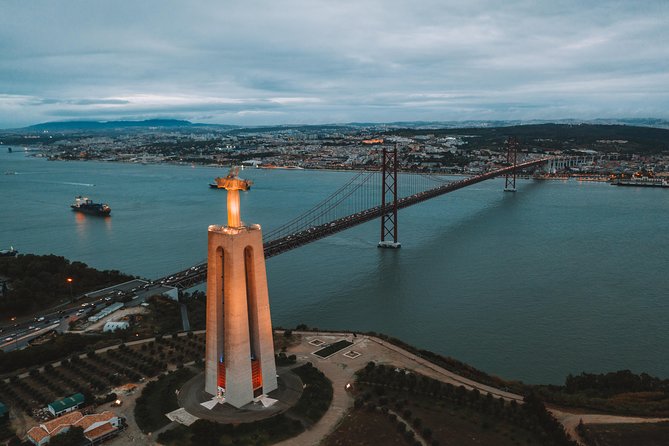 Explore Lisbon City on a private half-day tour in a van - April 25 Bridge to Cristo Rei: Symbolic Crossing and Supreme Views