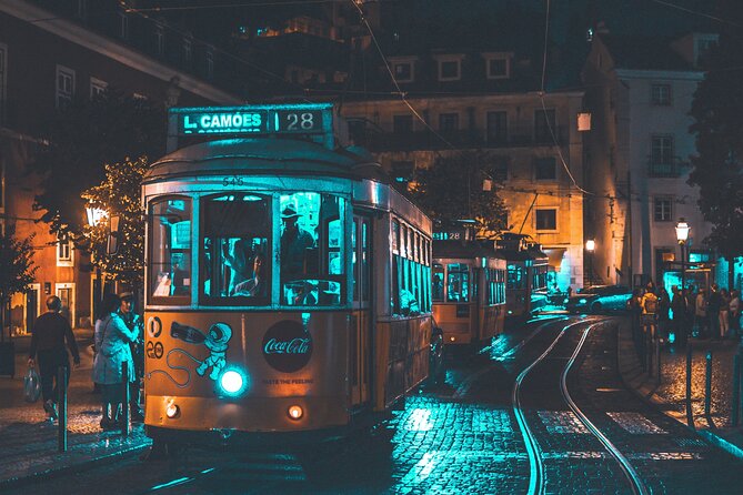 Fado Half Day Guided Tour with Dinner and Live Show in Lisbon - A live Fado show with singers close enough to matter