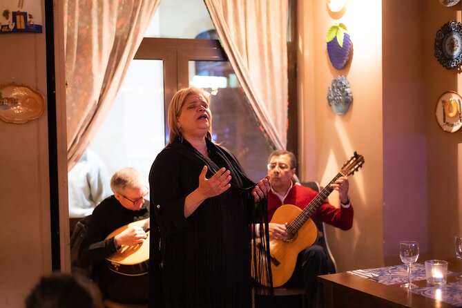 Fado Musical Experience with Portuguese Wine & Appetizers - The walk from Largo do Chafariz de Dentro to the fado neighborhood