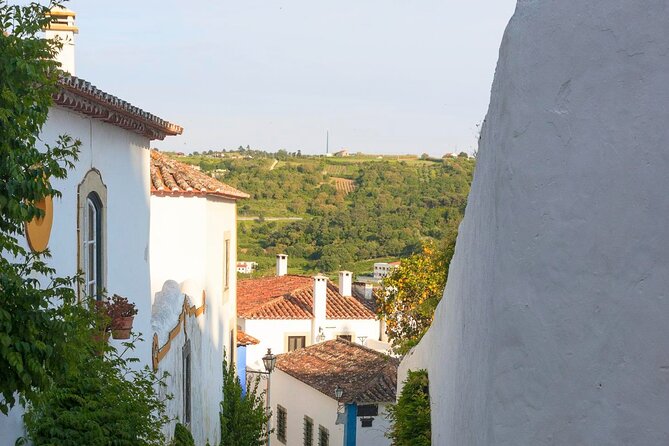 Fatima, Batalha, Nazaré & Óbidos Private Luxury Tour - Nazaré’s Sítio cliff: wave legends, shrine views, and sea air