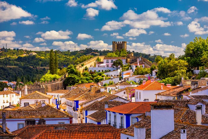 Fatima, Batalha, Nazare, Obidos Small Group Tour From Lisbon - Óbidos: walled medieval streets and ginjinha in a chocolate cup
