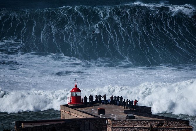 Fátima, Óbidos and Nazaré Private Tour from Lisbon - Nazaré church visit and waterfront walk: getting beyond the surf photo