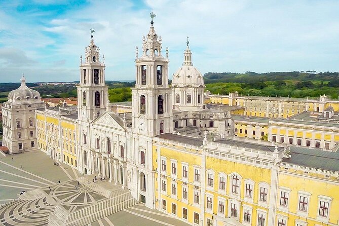 From Lisboa: Mafra, Ericeira & Queluz Private Full Day Tour - Mafra Palace-Convent: Royal Power, Basilica, Convent, and a Famous Library