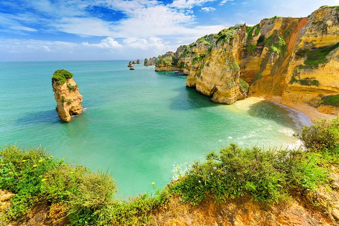 From Lisbon: Algarve Private Tour to Portimao, Lagos and Sagres - Praia da Marinha: Caramujeira cliffs and clear-water bragging rights