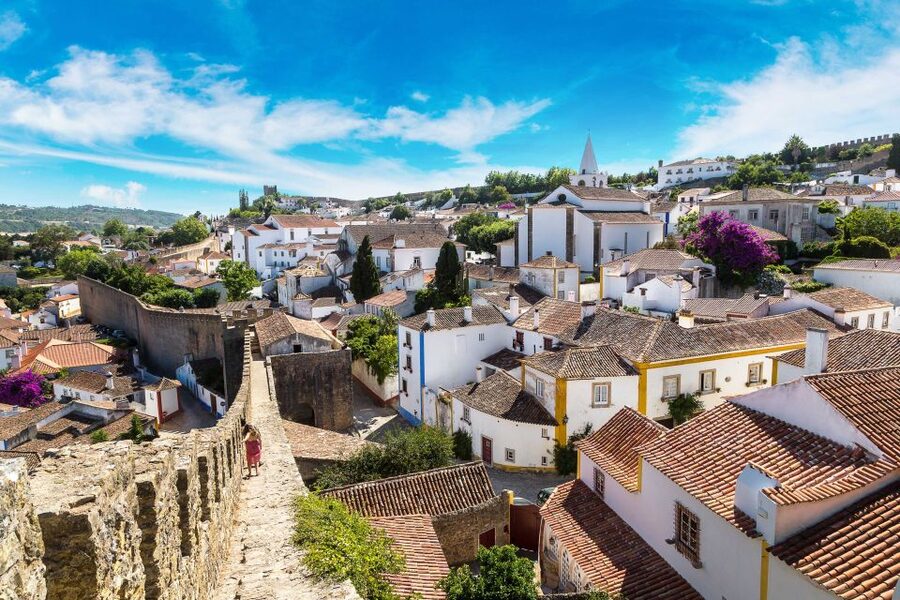 From Lisbon: Day Trip to Porto, Óbidos, and Nazaré - Óbidos walls and Rua Dereita: medieval lanes in 45 minutes