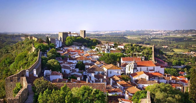 From Lisbon: Fátima, Nazaré, Batalha, and Óbidos Guided Tour - Batalha Monastery and UNESCO Gothic: What the Guide Turns Into Clarity