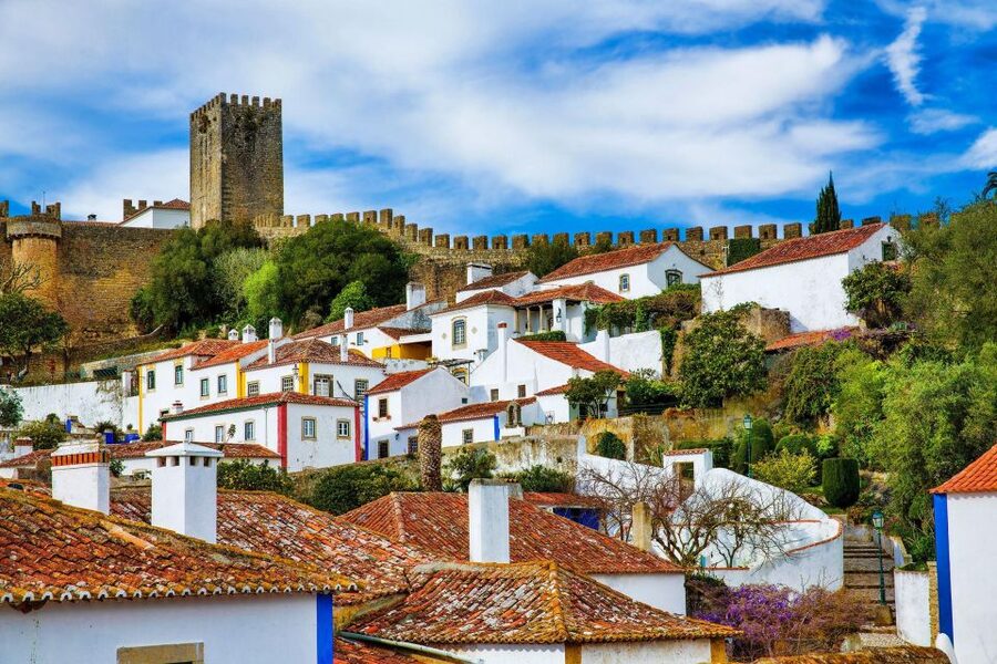 From Lisbon: Fátima, Óbidos Medieval, Nazaré Atlantic Coast - Lisbon Start and the Van Part You’ll Actually Care About