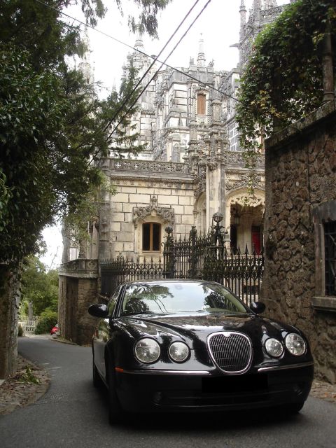 From Lisbon: Full-Day Sintra Tour by Luxury Car or Minivan - Pena Palace on the hill: fairytale architecture and major views