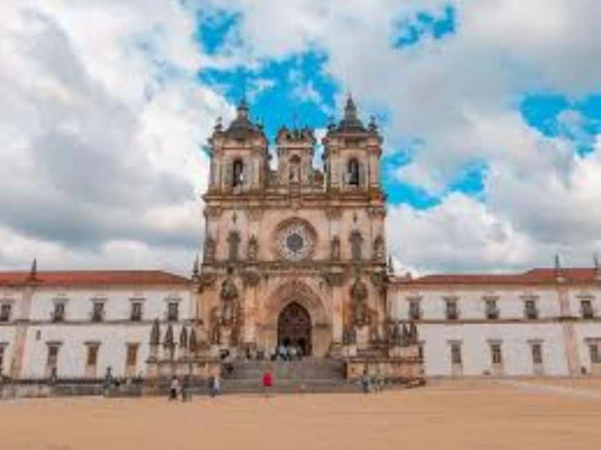 From Lisbon: Medieval Tour, Batalha, Tomar, Alcobaça, Óbidos - Óbidos, castle walls, guided time, and ginjinha in chocolate cups