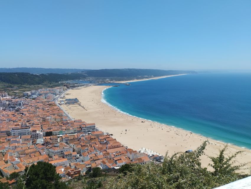 From Lisbon: Nazare and Sintra Private Tour - Sintra UNESCO Sights: Pena Palace Mentioned, Guided Town Time Delivered