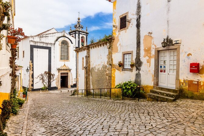 From Lisbon : Óbidos & Nazaré Giant Waves, Ginja & Small Group - Óbidos village: walls, Porta da Vila, and the hilltop views