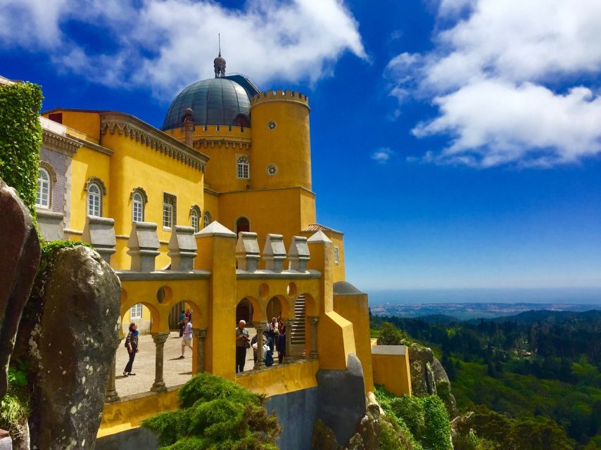 From Lisbon: Pena Palace, Regaleira, Sintra & Cascais Tour - What to pack for a hilly, weather-changing day