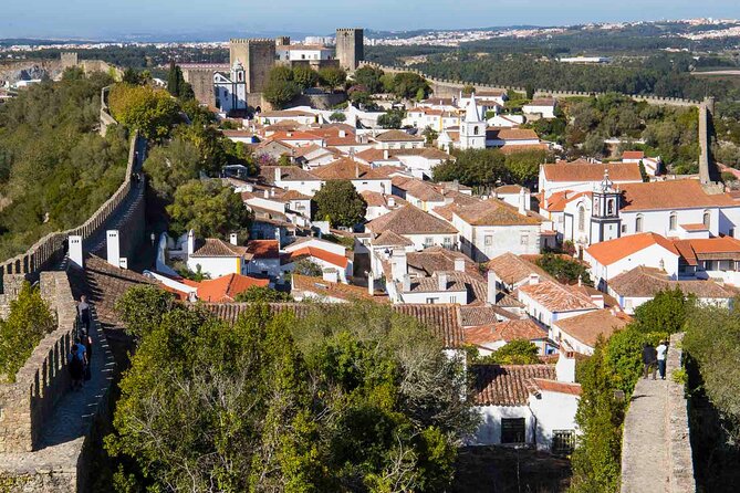 From Lisbon: Shared Tour to Fátima, Batalha, Óbidos, Nazaré - Rossio Square and the sour cherry liqueur break you can actually use