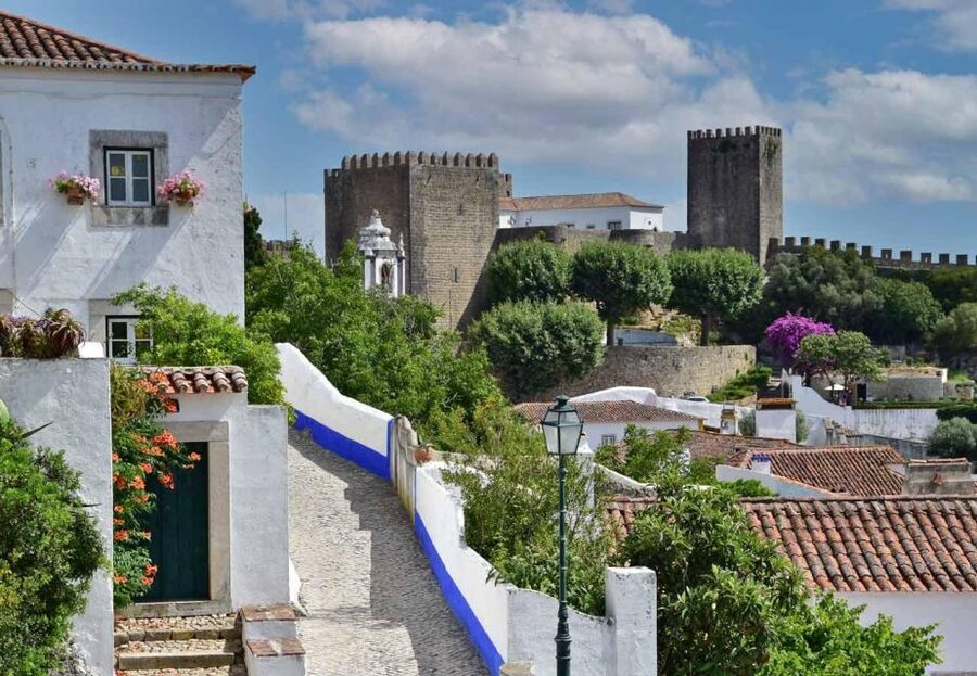 From Lisbon: Shared Tour to Fátima, Óbidos, Batalha e Nazaré - Nazaré: North Beach wave views and a walk through the old fishing town