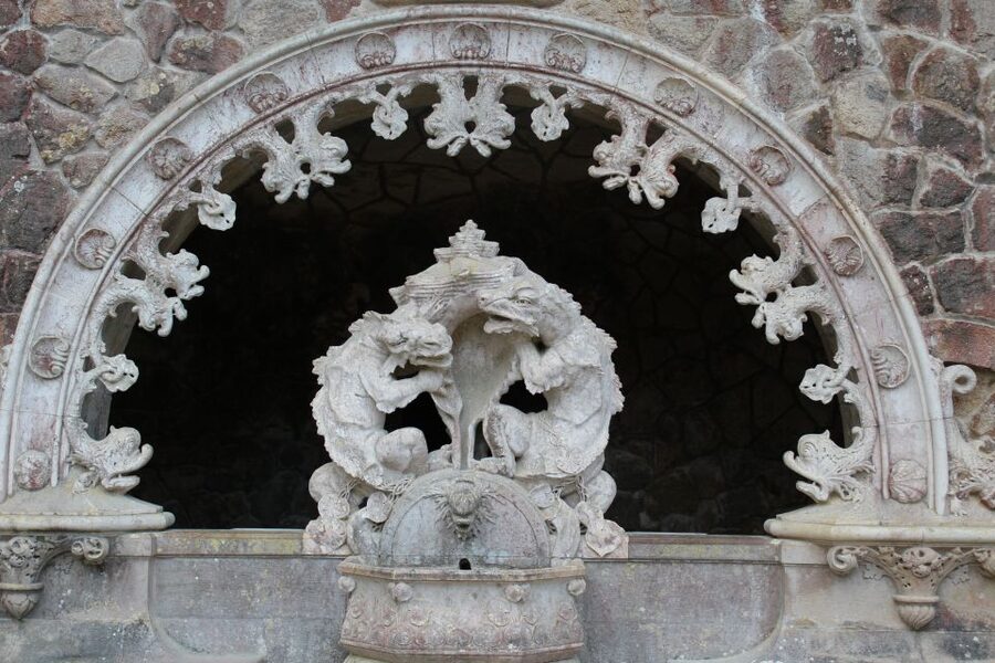 From Lisbon: Sintra, Cabo da Roca, Cascais, & Estoril Tour - Quinta da Regaleira: the gardens with wells, grottoes, and hidden symbolism