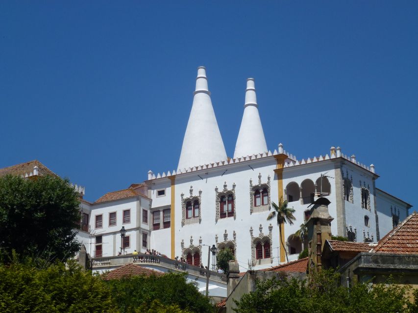 From Lisbon: Sintra Pena Palace Cascais 8-People Group Tour - Cascais lunch and seaside wandering: a real break from hills
