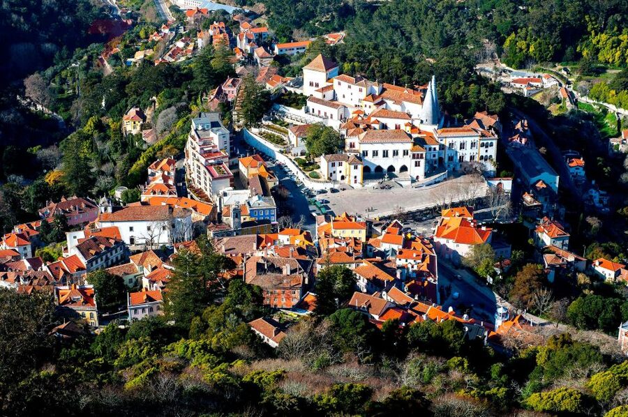 From Lisbon: Sintra, Pena Palace, Regaleira, Guided Day Tour - Quinta da Regaleira: gardens, myths, and the Initiatory Well