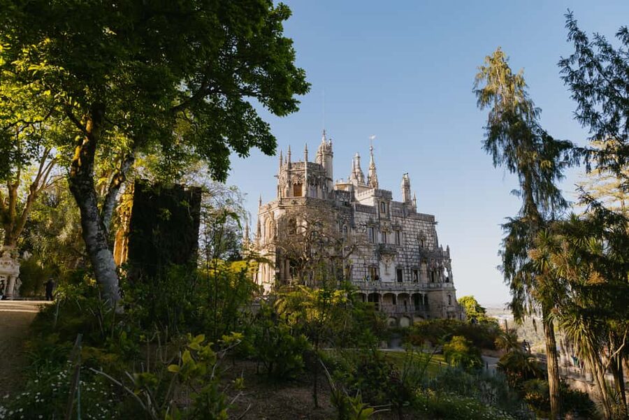 From Lisbon: Sintra, Regaleira and Pena Palace Guided Tour - Price and value: $51, skip-the-line benefits, and ticket options you must confirm