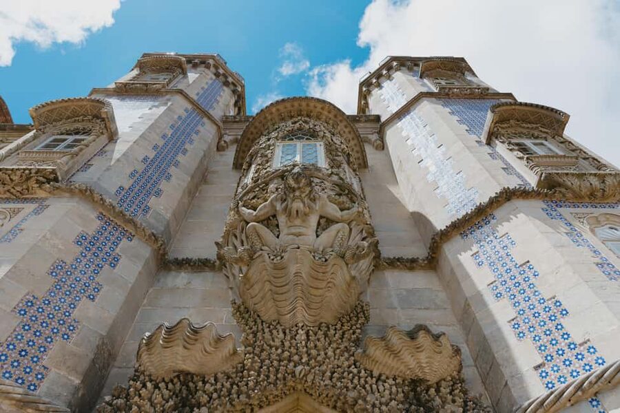 From Lisbon: Sintra, Regaleira and Pena Palace Guided Tour - Quinta da Regaleira: gardens, grottoes, lakes, and the Initiation Well
