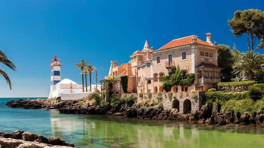 From Lisbon: Tour Sintra, Pena Palace, Regaleira and Cascais - The Drive Between Stops: Lisbon Shoreline Perspective at the End