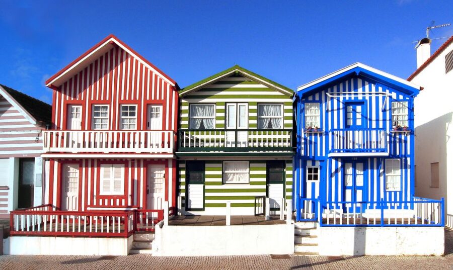 From Lisbon: Town-Hopping Transfer to Porto - Costa Nova: a brief fishing-town pause before arriving in Porto