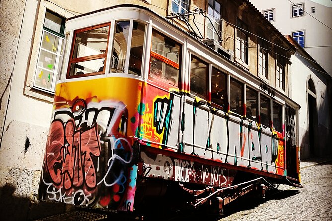 Full Day Lisbon Tour Baixa Chiado with Alfama and Belem - Alfama: steep lanes, old walls, and the atmosphere that stays