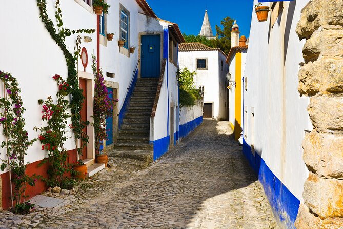 Full Day Private Transfer - From Lisbon to Porto Tour - Óbidos Castle and the 1 Hour Village Walk