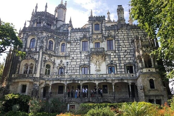 Full Day Sintra Private Tour with All Tickets Included - Cascais: coastal road, Guincho Beach pass, and an old fisherman village feel